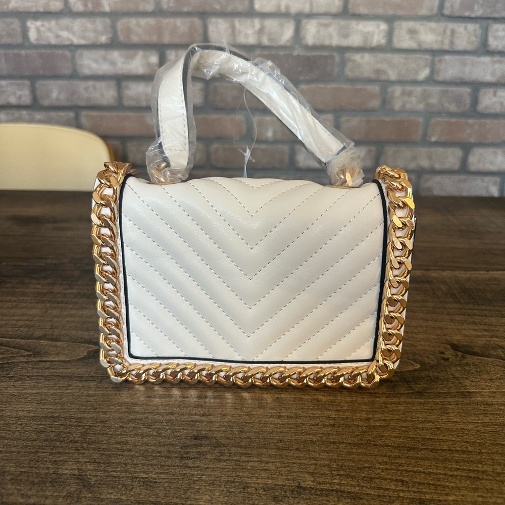 Beige and gold Aldo purse
